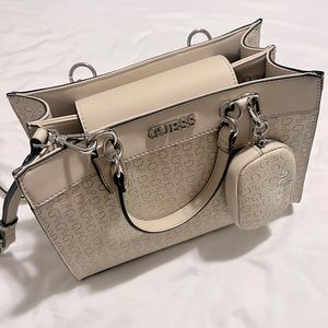 Medium size Beige GUESS purse.